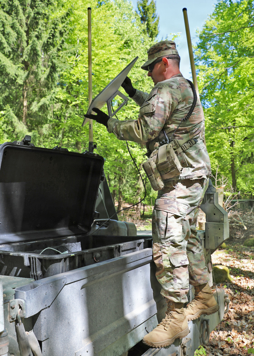 Sgt. 1st Class Robert Malone, a signal Observer Coach/Trainer with 7th Army Training Command, Joint Multinational Readiness Center’s Grizzly Team prepares to mount the Starlink antenna as part of the Banshee Mobile Radio (BMR) / Battlefield Edge Netw